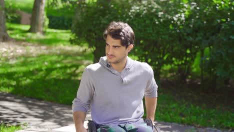 Young-disabled-person-in-wheelchair-being-angry-in-slow-motion.